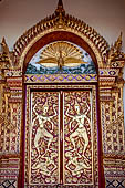 Chiang Mai - Wat Phra That Doi Suthep. Decorated door on the back wall of the temple.